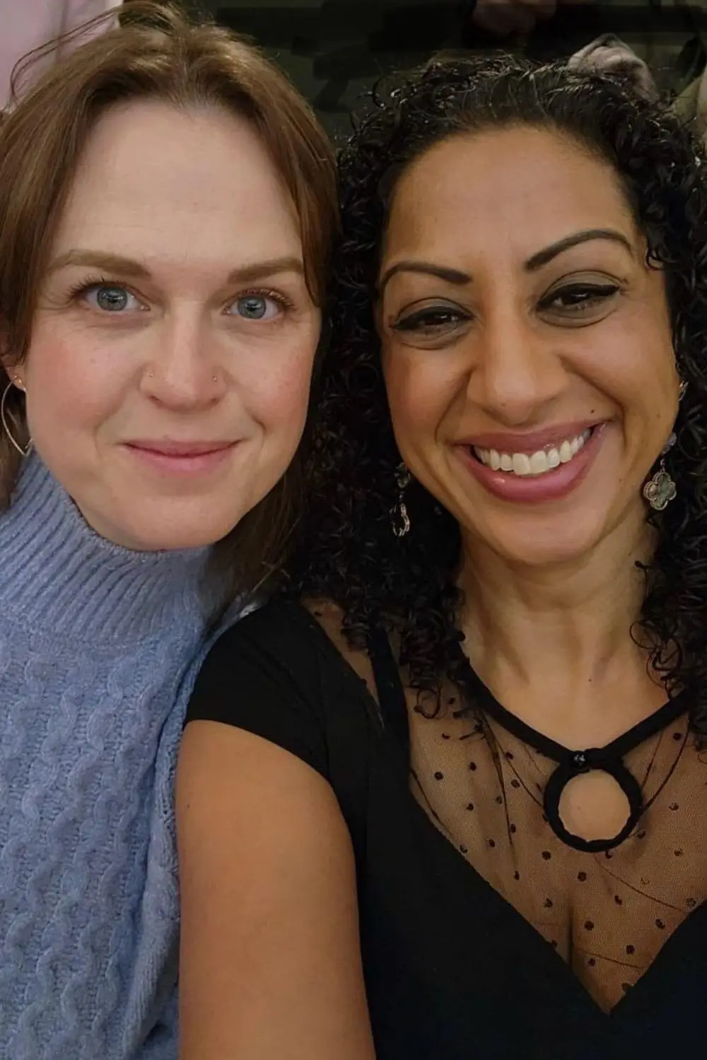 Heidi Jordan and Pam Dhillon, close together and smiling at the camera.
